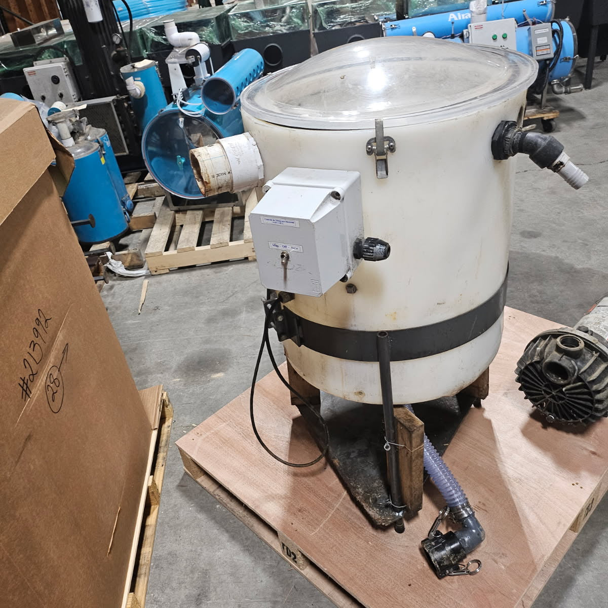 White Electric Belly Releaser with 1 1/2 HP External Pump and a Spare Pump